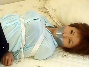 Japanese Girl Tape Gagged In Skirt And Blouse